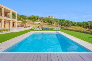The swimming pool at or close to Ca'n Gatulux