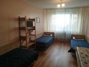 Postel nebo postele na pokoji v ubytování Mahtra Hostel