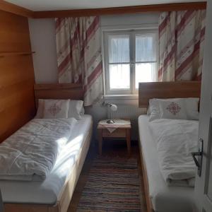 Ένα ή περισσότερα κρεβάτια σε δωμάτιο στο Jagerhäusl
