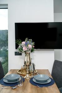 TV a/nebo společenská místnost v ubytování Alexandra Apartments
