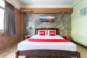 Cama o camas de una habitación en OYO 1118 KL boutique Hotel