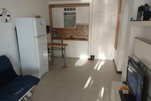 A kitchen or kitchenette at Vista Taurito