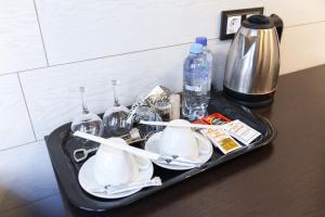 
Принадлежности для чая и кофе в Отель Облака
