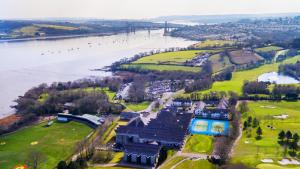 an aerial view of a park next to the river at China Fleet Country Club in Saltash