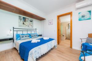 Posteľ alebo postele v izbe v ubytovaní Casa Paqui Alcudia