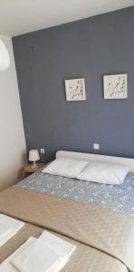 Katil atau katil-katil dalam bilik di Apartment Nano-maris
