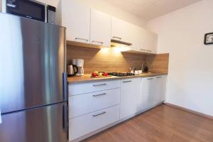 Kuchyň nebo kuchyňský kout v ubytování Apartment Samlandin