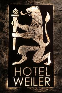 Majutusasutuses Hotel Weiler - Aktiv & Tradition olev sertifikaat, autasu, silt või muu dokument