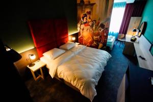 Postel nebo postele na pokoji v ubytování Hotel Viktorosa
