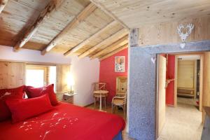 Postel nebo postele na pokoji v ubytování Les chalots de Gérardmer, Chambre d'Hôtes