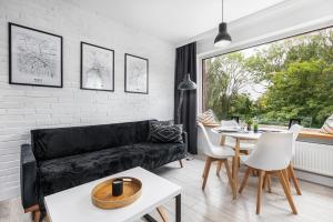 Posedenie v ubytovaní Apartamenty Solny Brzeg by Renters Prestige + 10 fotografií
