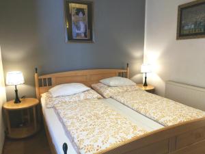 Ein Bett oder Betten in einem Zimmer der Unterkunft Gästezimmer & Apartment Mayrhofer