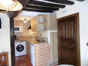 Kuchyň nebo kuchyňský kout v ubytování Apartamentos Azahar