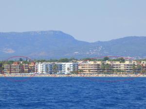 two nets in the water in front of a beach at Rentalmar Sol de España - Mas d'en Gran in Cambrils