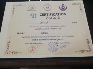 a certificate for a certificate of merit in a document at King Hotel Cairo in Cairo