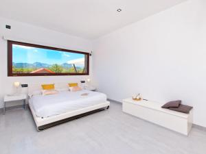 Tempat tidur dalam kamar di Villa Es Velar 34 de Binissalem