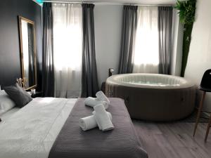 Posteľ alebo postele v izbe v ubytovaní Apartment Zagreb Jacuzzi