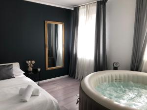 Posteľ alebo postele v izbe v ubytovaní Apartment Zagreb Jacuzzi
