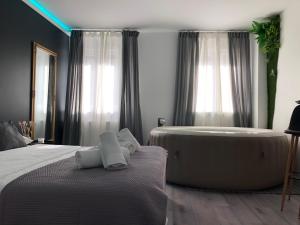 Posteľ alebo postele v izbe v ubytovaní Apartment Zagreb Jacuzzi