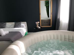 Posteľ alebo postele v izbe v ubytovaní Apartment Zagreb Jacuzzi