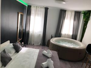 Posteľ alebo postele v izbe v ubytovaní Apartment Zagreb Jacuzzi