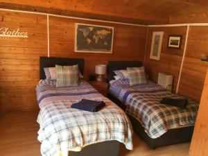 A bed or beds in a room at The Theberton Lion 