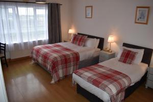 Katil atau katil-katil dalam bilik di O'Connor's Accommodation