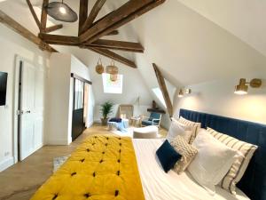 Кровать или кровати в номере La Maison de Reina