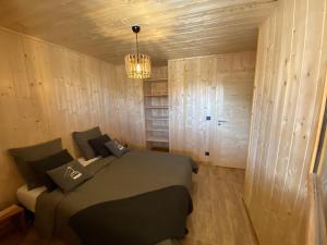 Postel nebo postele na pokoji v ubytování WHYMPER Chalet mitoyen proche pistes avec vue panoramique