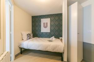 Posteľ alebo postele v izbe v ubytovaní Apartments WS Tour Eiffel - Nicolo