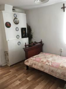 Katil atau katil-katil dalam bilik di Mazanka ua Під Вишнею унікальний будинок на березі річки