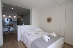 A bed or beds in a room at Lakones Deluxe Suites A
