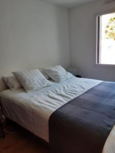 Postel nebo postele na pokoji v ubytování kercady 1