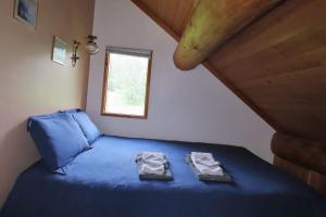 Postel nebo postele na pokoji v ubytování Rocky Ridge Resort-BC