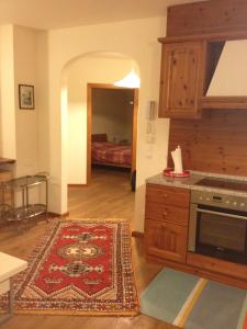 Kuchyň nebo kuchyňský kout v ubytování Appartement Colussi