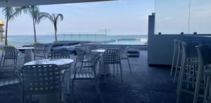 Hotel Plaza Sol Veracruz tesisinde bir restoran veya yemek mekanı