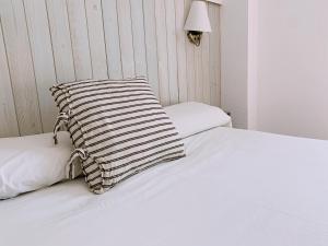 Postel nebo postele na pokoji v ubytování Boutike Guesthouse