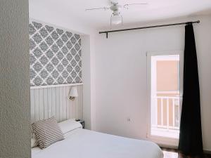 Postel nebo postele na pokoji v ubytování Boutike Guesthouse