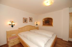 Katil atau katil-katil dalam bilik di Hotel Wechselberger by Alpeffect Hotels