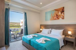 A bed or beds in a room at Sisi Breeze Hotel