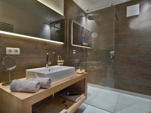 Ванна кімната в Riedz Apartments Innsbruck- Zentrales Apartmenthaus mit grüner Oase