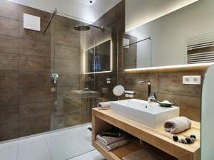 Ένα μπάνιο στο Riedz Apartments Innsbruck- Zentrales Apartmenthaus mit grüner Oase
