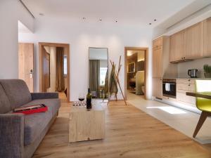 Ruang duduk di Riedz Apartments Innsbruck- Zentrales Apartmenthaus mit grüner Oase