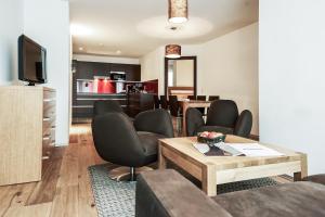 Telewizja i/lub zestaw kina domowego w obiekcie Sport- und Genusshotel Silvretta