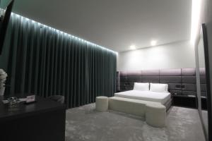 Postel nebo postele na pokoji v ubytování Albes Hotel