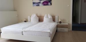Ένα ή περισσότερα κρεβάτια σε δωμάτιο στο Hotel Cherusker Hof