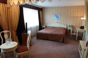 Postel nebo postele na pokoji v ubytování Hotel Druzhba + 29 fotografií