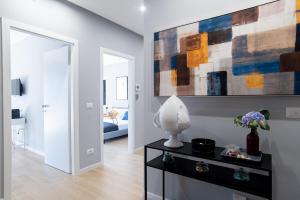 Postel nebo postele na pokoji v ubytování Il Pumo - Apulian Rooms Bari Piazza Moro