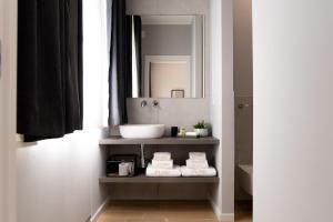 Postel nebo postele na pokoji v ubytování Il Pumo - Apulian Rooms Bari Piazza Moro