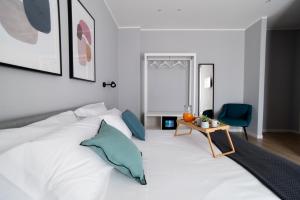 Postel nebo postele na pokoji v ubytování Il Pumo - Apulian Rooms Bari Piazza Moro